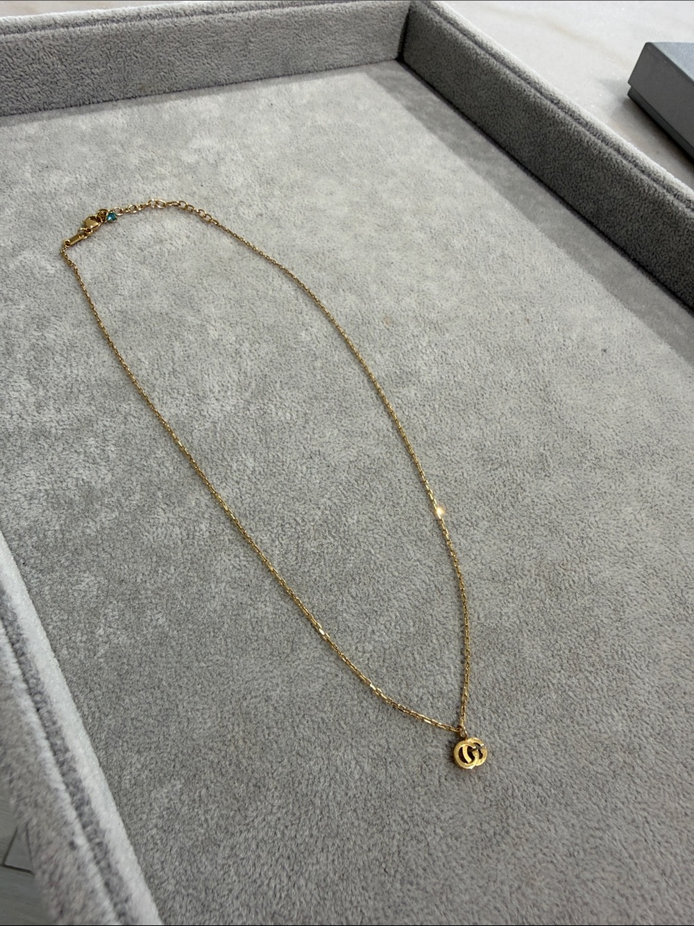 Gucci 18K Yellow Gold Blue Topaz Running G Pendant Necklace